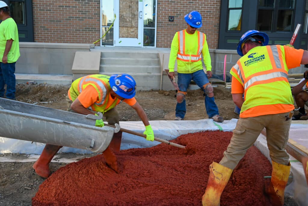 Workers shoveling